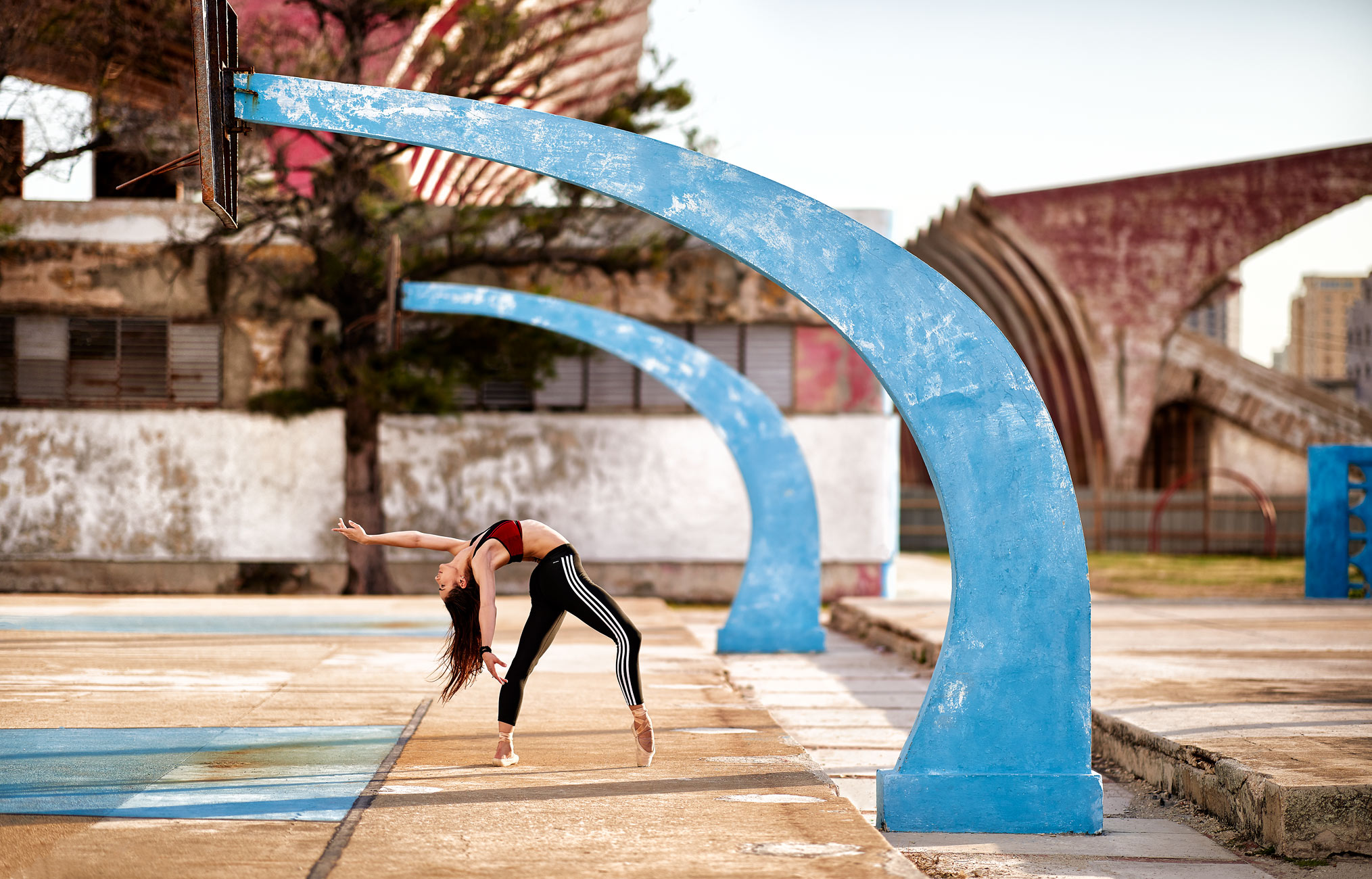 Cuban Ballerina on basketball court.
